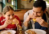 Family Enjoying Denny's